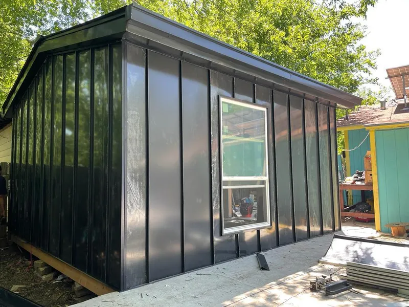 Black standing seam metal wall panels for Roof Inspection in Burrillville