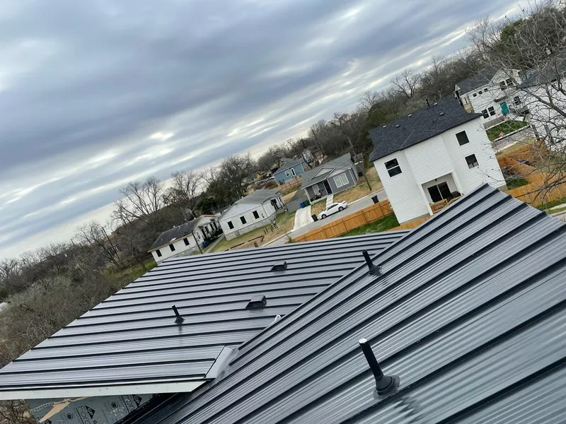 Standing seam metal roof panels with vents for Skylight Repair in Burrillville